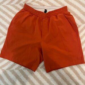Men's Lulu Orange swim trunks